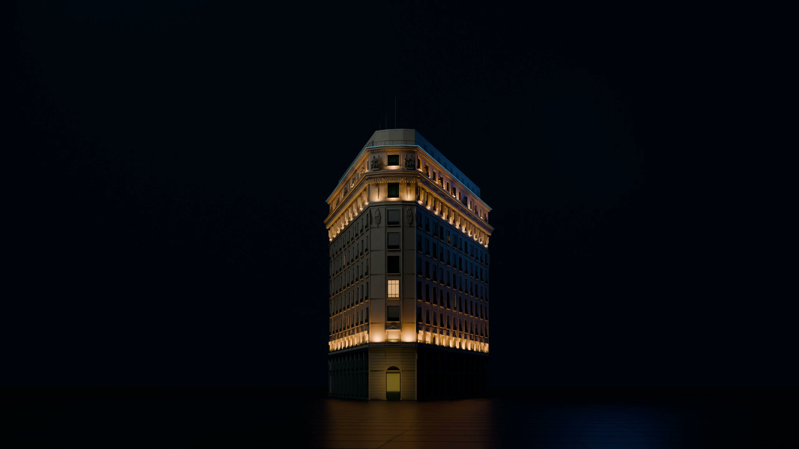 Edificio Sudamérica, sin cúpula, bajo luz ámbar y azul.